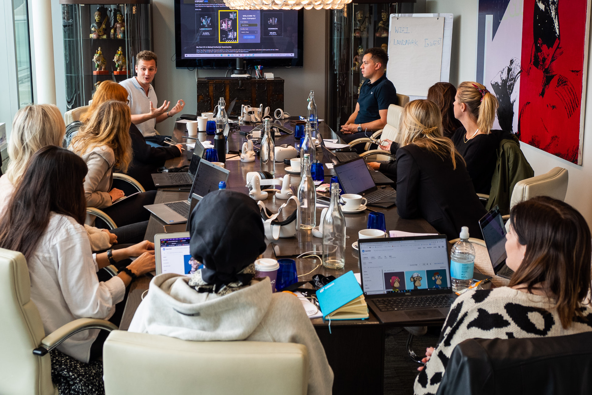 Senior buyers sitting around a boardroom table at a 3rd Eye immersive roundtable